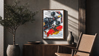 F1 driver celebrating beside race car poster framed above a fluted sideboard beside an olive tree