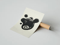 Gently curled Melting 8 Ball print beside its protective shipping tube