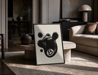 Melting 8 Ball print on the floor, leaning against a travertine table