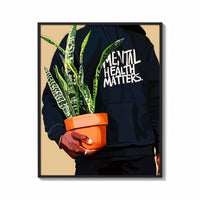 Framed Mental Health Matters Hoodie and Potted Plant print shown as a bold statement piece on a clean gallery wall