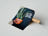 Gently curled Mental Health Matters Potted Plant print beside its protective shipping tube