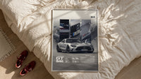 Mercedes-AMG GT Black Series framed print styled on a bed with sneakers alongside