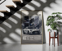 Mercedes-AMG GT Black Series framed print on a staircase entryway wall beside a plant
