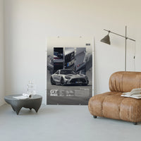 Mercedes-AMG GT Black Series poster framed above a tan leather living-room couch