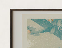 Close-up of the Vintage biplane flying in snow print's dark wood frame corner and archival matte paper
