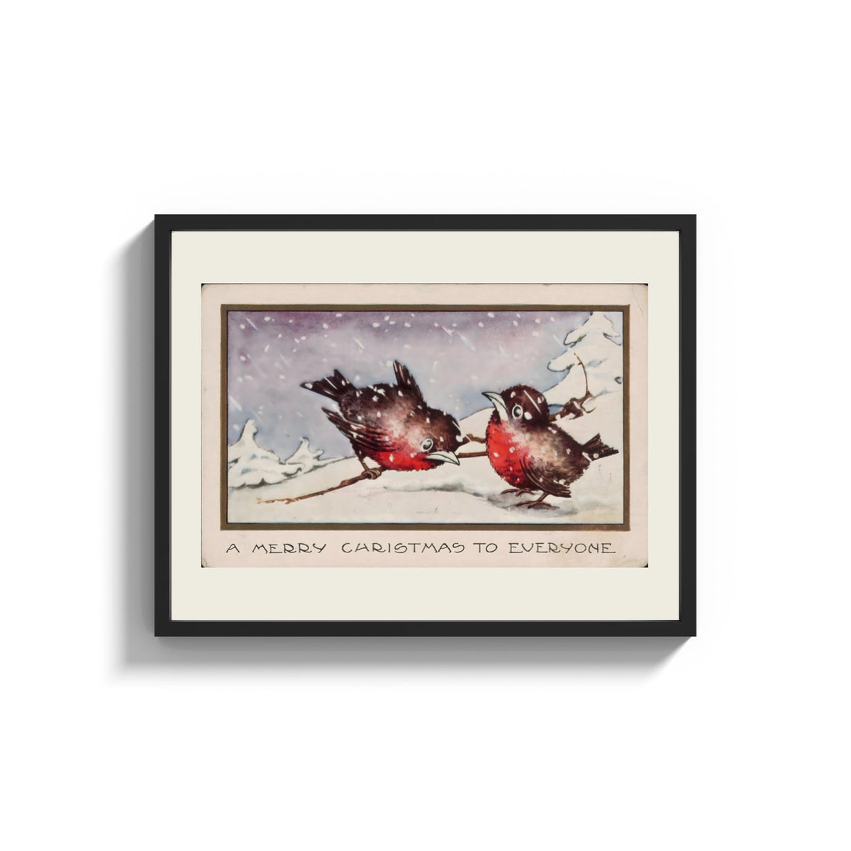 Framed Two red robins on branch print shown as a wide statement piece on a clean white wall