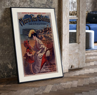 Woman and child at beach print in a black frame leaning beside a vintage door on parquet