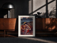 Black-framed woman and child at beach print on a moody console with designer coffee-table books