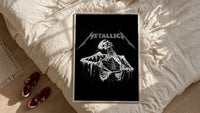 Metallica Decaying Corpse Skeleton framed print styled on a bed with sneakers alongside