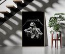 Metallica Decaying Corpse Skeleton framed print on a staircase entryway wall beside a plant