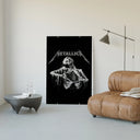 Metallica Decaying Corpse Skeleton poster framed above a tan leather living-room couch