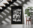 Metallica The Memory Remains framed print on a staircase entryway wall beside a plant