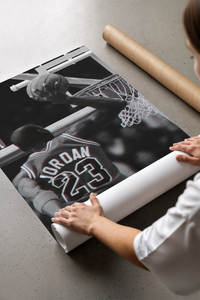 Basketball player dunking with NBA logo visible print laid flat in a styling flatlay