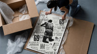 Michael Jordan slam dunk framed print being unpacked from protective bubble wrap and a box