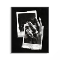 Black and white Michael Jordan six rings poster on a wall showing hands wearing championship rings