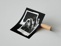 Unframed monochrome Michael Jordan six rings basketball print beside a cardboard shipping tube