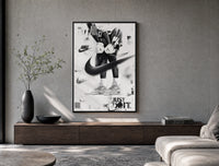 KAWS figure wearing Air Jordan sneakers poster framed above a wood console in a concrete-wall living room