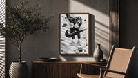 KAWS figure wearing Air Jordan sneakers poster framed above a fluted sideboard beside an olive tree