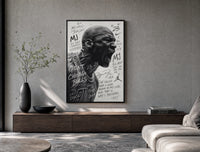 Michael Jordan screaming portrait poster framed above a wood console in a concrete-wall living room