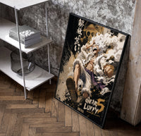 Laughing white-haired anime warrior poster in a black frame leaning beside a shelf in a raw-plaster loft
