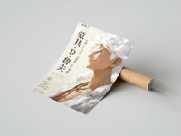 Rolled White-haired smiling anime man profile poster beside its crush-resistant kraft shipping tube