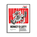 Monkey D. Luffy wanted poster hung unframed on a minimalist white wall above a desk
