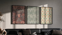 Victorian floral wallpaper patterns triptych triptych in three black frames on a grey wall above a leather sofa