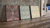 Victorian floral wallpaper patterns triptych three-piece set leaning on parquet beside a vintage loft door