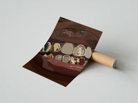 Gently curled Mouth with Jeweled Gold Grillz print beside its protective shipping tube