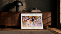 Four women representing the four seasons print in a black frame leaning against a walnut console in lamplight