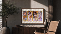 Four women representing the four seasons print in a wood frame above a fluted sideboard beside an olive tree