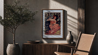 Woman with flowing dark hair smoking poster framed above a fluted sideboard beside an olive tree