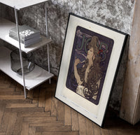 Woman with flowing hair smoking poster in a black frame leaning beside a shelf in a raw-plaster loft