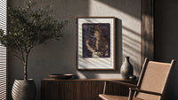 Woman with flowing hair smoking poster framed above a fluted sideboard beside an olive tree