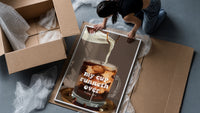 My Cup Runneth Over Coffee framed print being unpacked from protective bubble wrap and a box