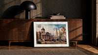 London National Gallery vintage cityscape print in a black frame leaning against a walnut console in lamplight