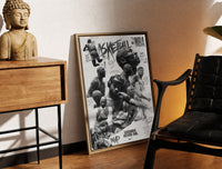 Brass-framed NBA basketball legends collage print leaning in a warm styled corner by a sculpture