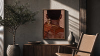 Neckline Trim with Clippers poster framed above a fluted sideboard beside a potted tree