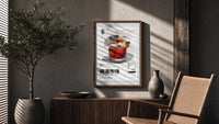 Negroni Cocktail Market poster framed above a fluted sideboard beside a potted tree