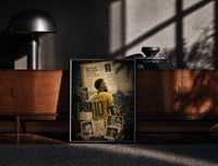 Black-framed Neymar Jr in a Brazil number 10 jersey print on a moody console with designer coffee-table books