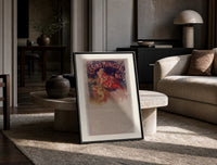 Woman with cymbals and mandolin player print in a black frame leaning on a travertine table in a sunlit lounge