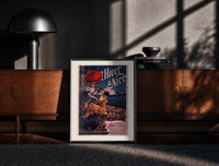 Black-framed two elegant women with red parasol print on a moody console with designer coffee-table books