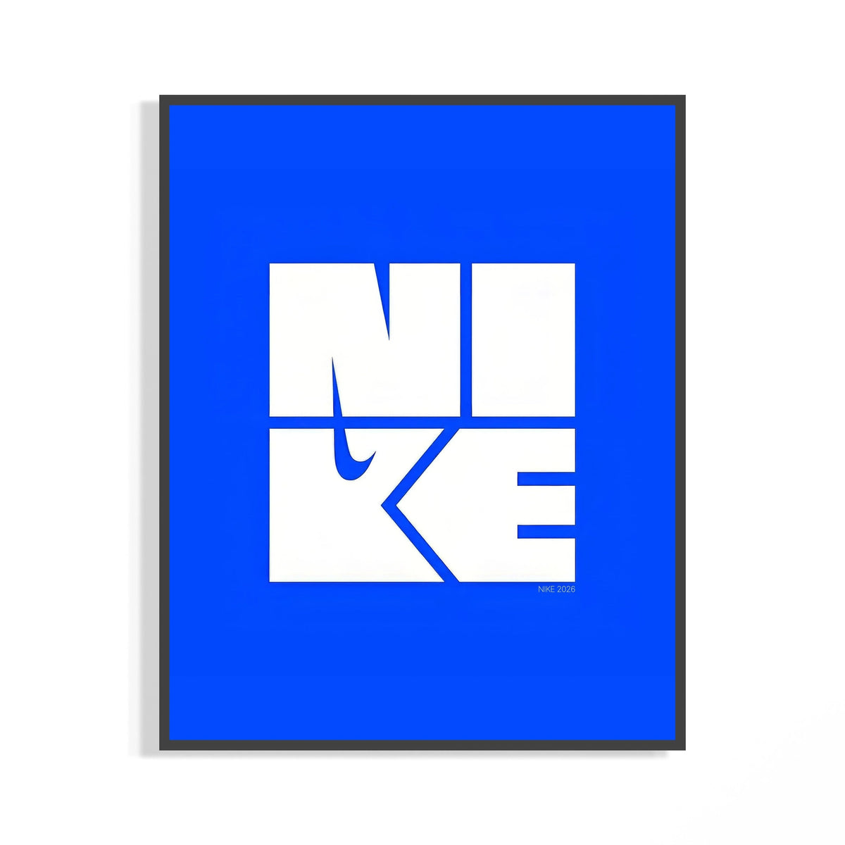 Framed Nike wordmark logo with swoosh graphic print displayed as a statement piece