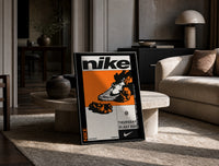 Nike Blazer high-top sneaker print in a black frame leaning on a travertine table in a sunlit lounge