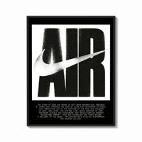 Framed Nike Air logo with swoosh print shown as a bold statement piece on a clean gallery wall
