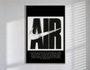 Nike Air logo with swoosh poster in a slim frame on a bright wall with soft window light