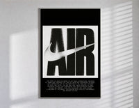 Nike Air logo with swoosh poster in a slim frame on a bright wall with soft window light
