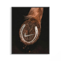 Black framed Nike Horse Hoof Swoosh art with horseshoe and swoosh against a dark moody backdrop