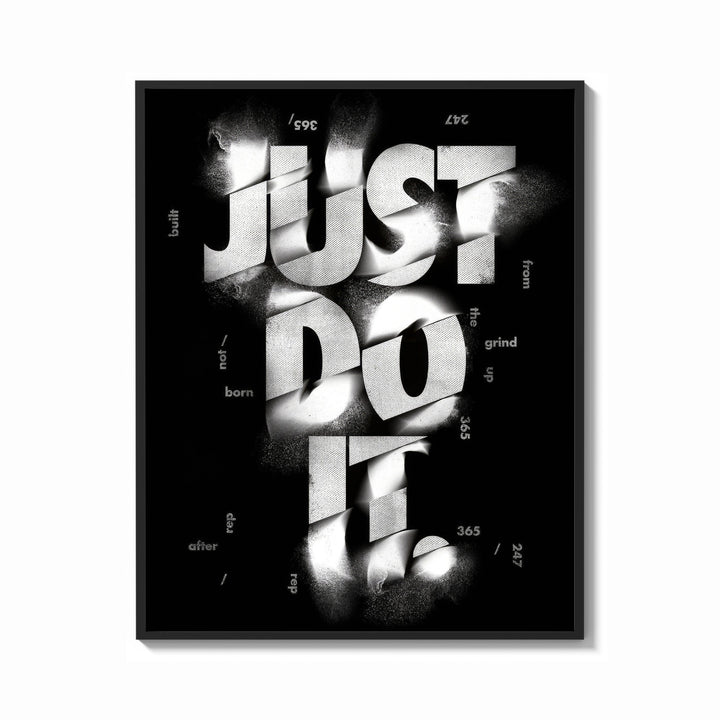 Framed Just Do It typography design print shown as a bold statement piece on a clean gallery wall