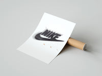 Rolled Blurred Nike swoosh logo poster beside its crush-resistant kraft shipping tube